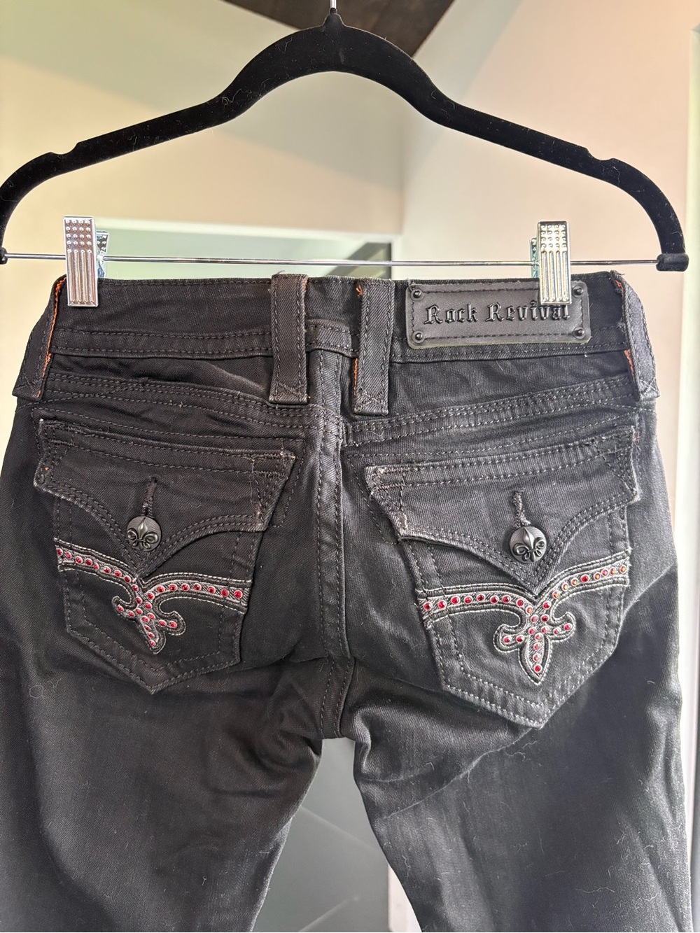 Rock Revival Black Skinny Jeans with Red Crystal Pocket Accents